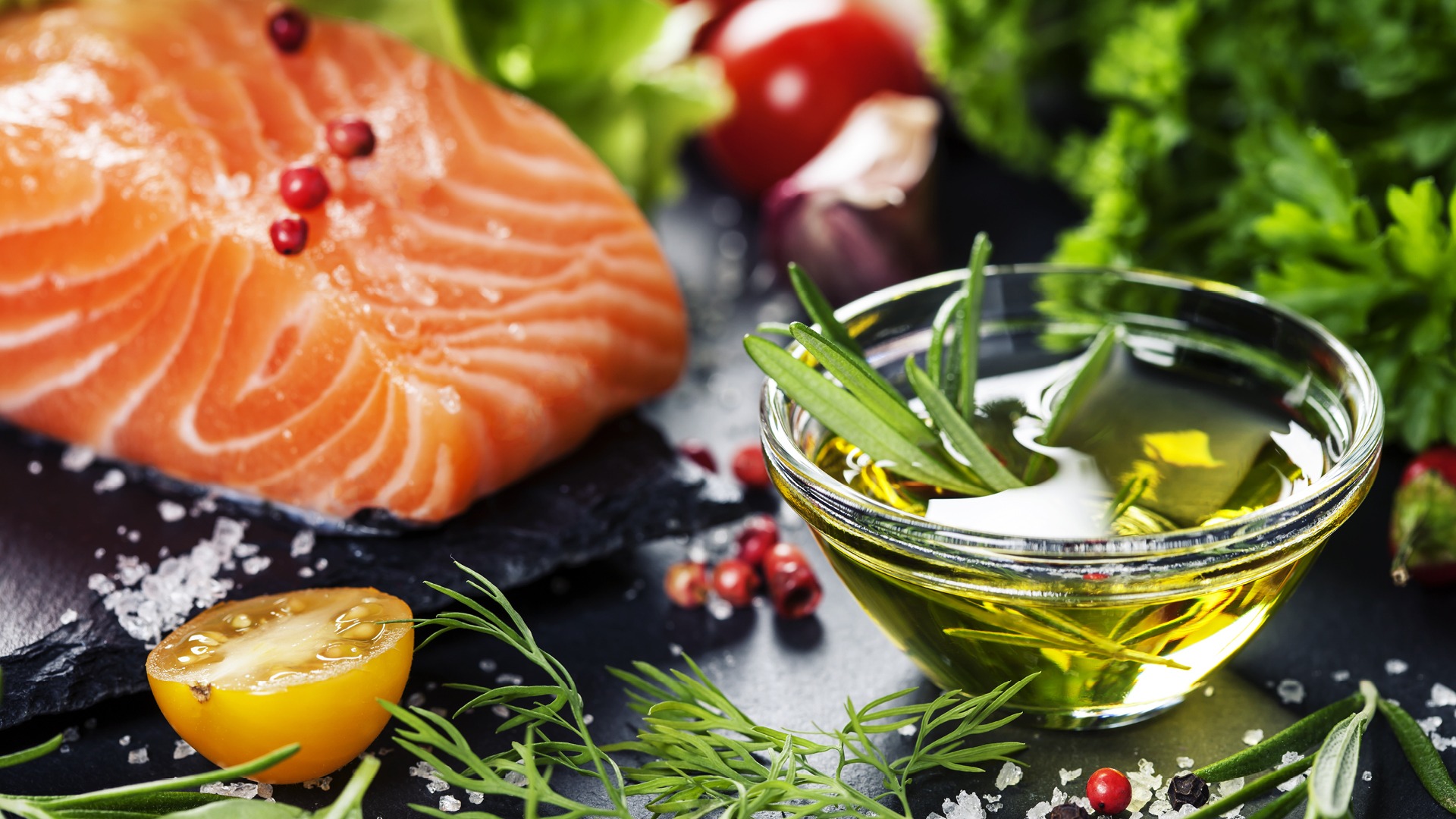 Salmon, oil vegetables and herbs cooking concept photo